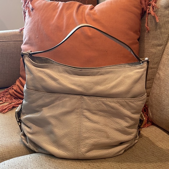 Michael Kors, beige hobo handbag with gold hardware. - Picture 2 of 4